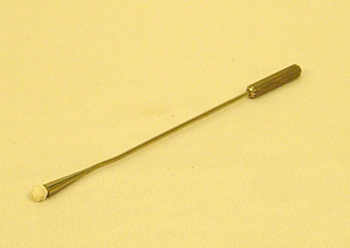 Bullet probe consisting of a long, thin handle with a white porcelain ball on the end.